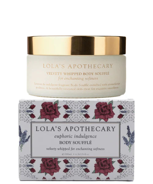 A jar of Euphoric body souffle cream on top of floral gift box