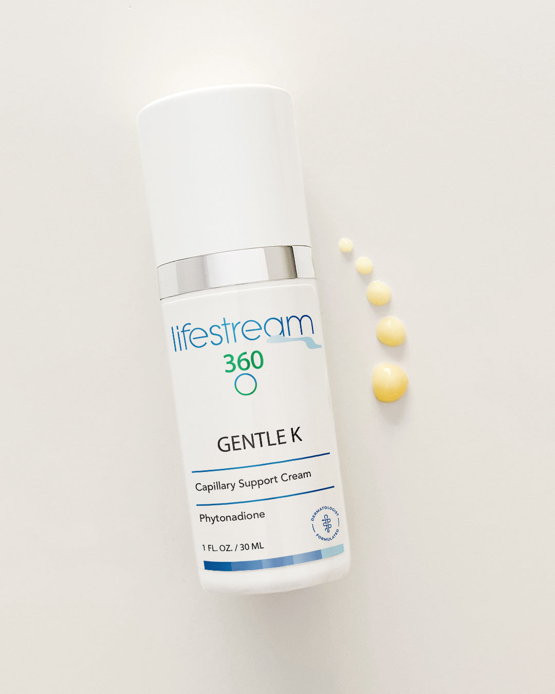 Gentle K face cream moisturizer bottle with yellow droplets on a white background