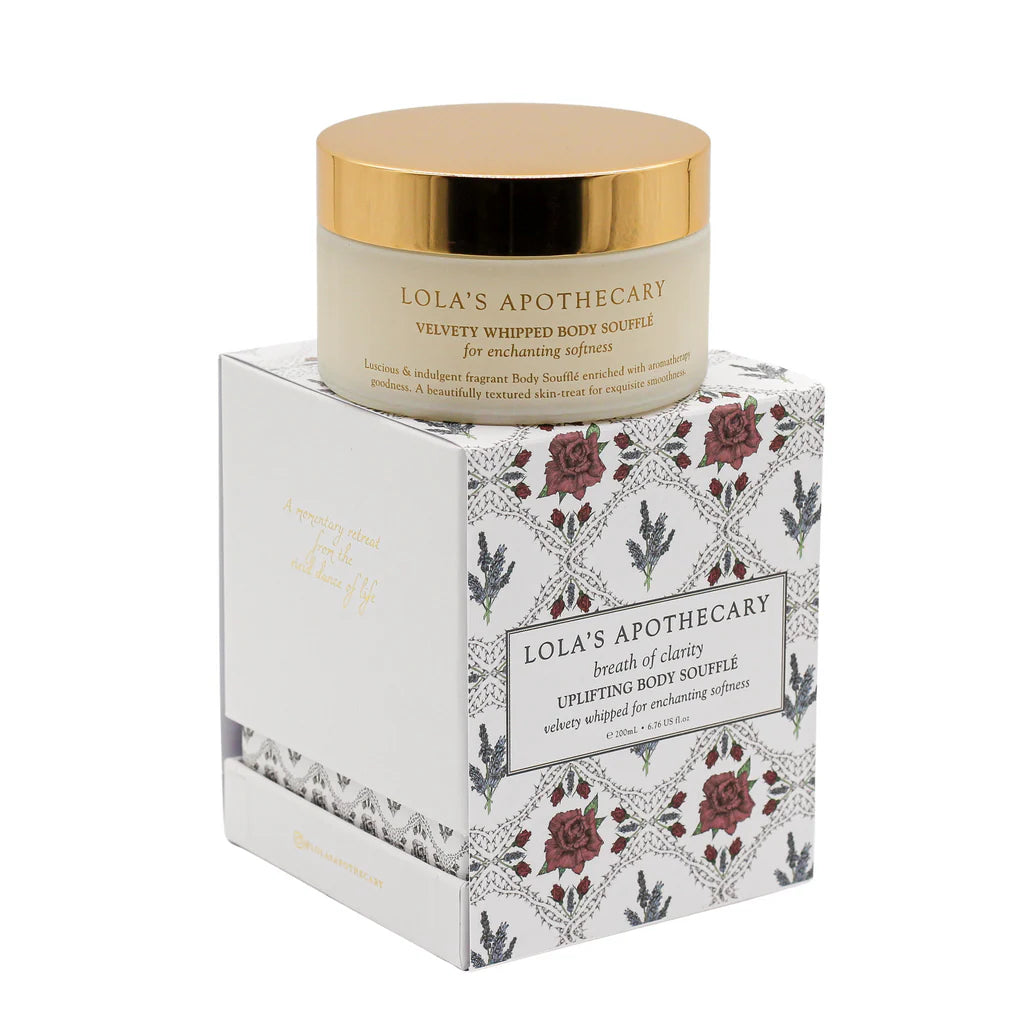 Jar of breath of clarity uplifting body souffle cream on top of gift box