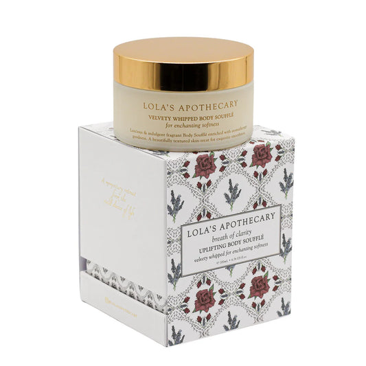 Jar of breath of clarity uplifting body souffle cream on top of gift box