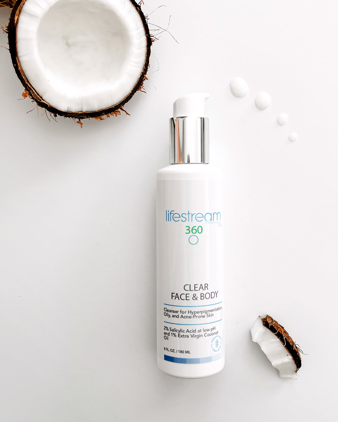 Lifestream bottle of face and body wash on a white background with coconut halves