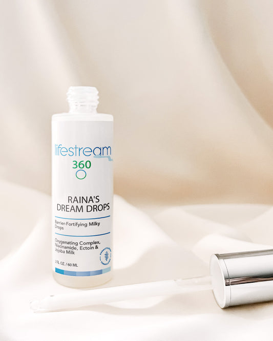 Lifestream Raina's Dream Drops open bottle on a soft beige background