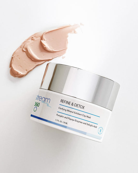 Jar of Refine and Detox  clay mask with a swatch of pink clay on a light background 