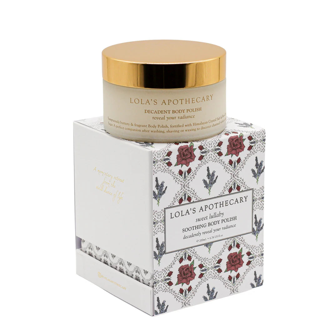 A jar of sweet lullaby body polish on top of a floral gift box
