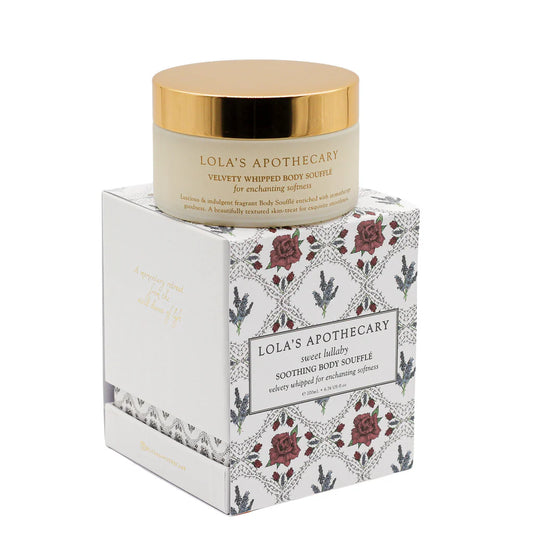 Jar of Sweet Lullaby body souffle  cream sitting on a floral gift box