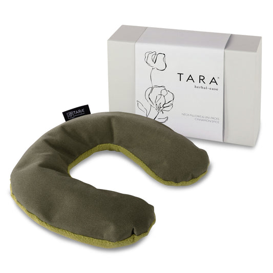 Green neck pillow with 'TARA' branding and packaging on a white background