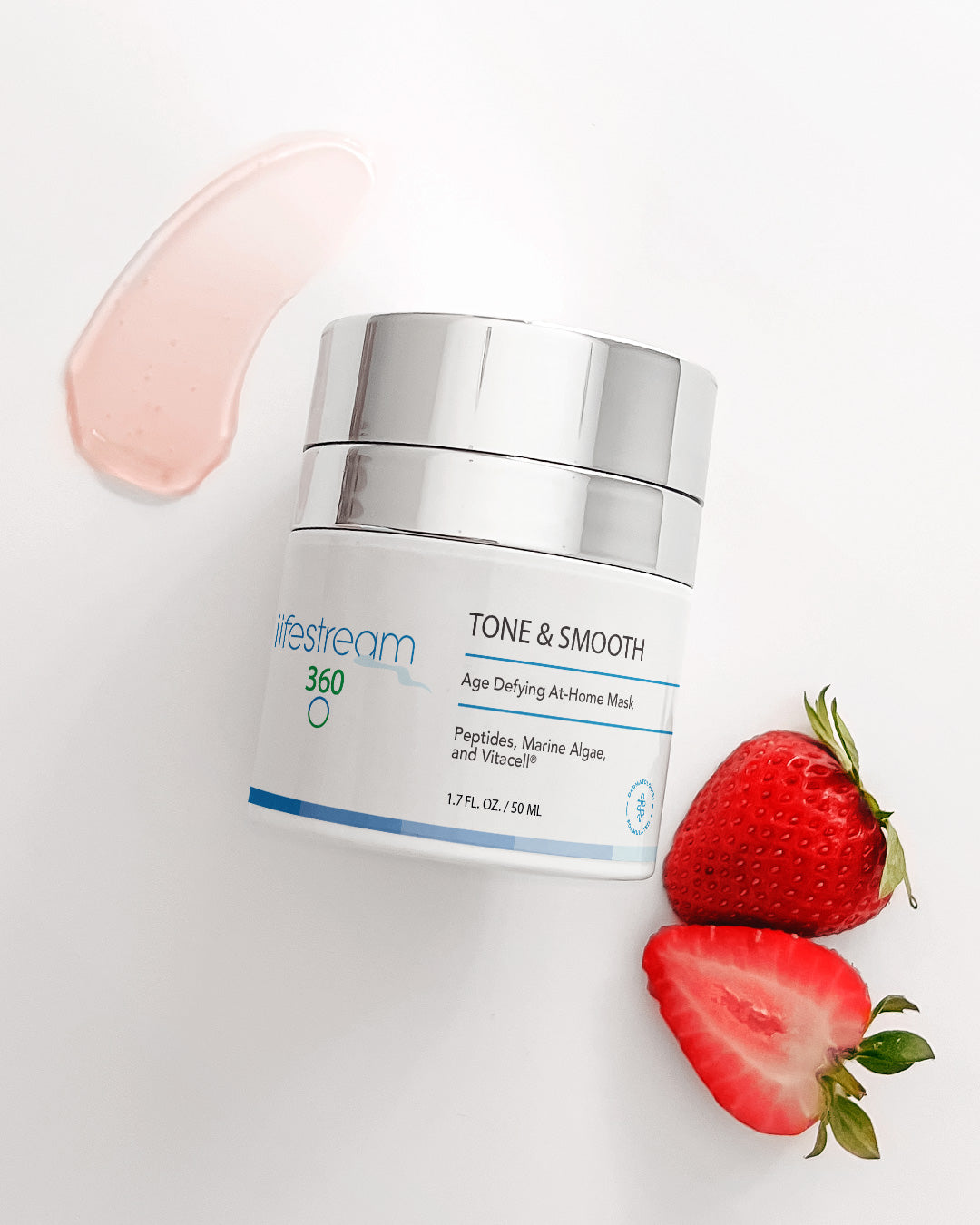  Jar of anti aging gel mask labeled "Tone & Smooth" with a strawberry on a white background