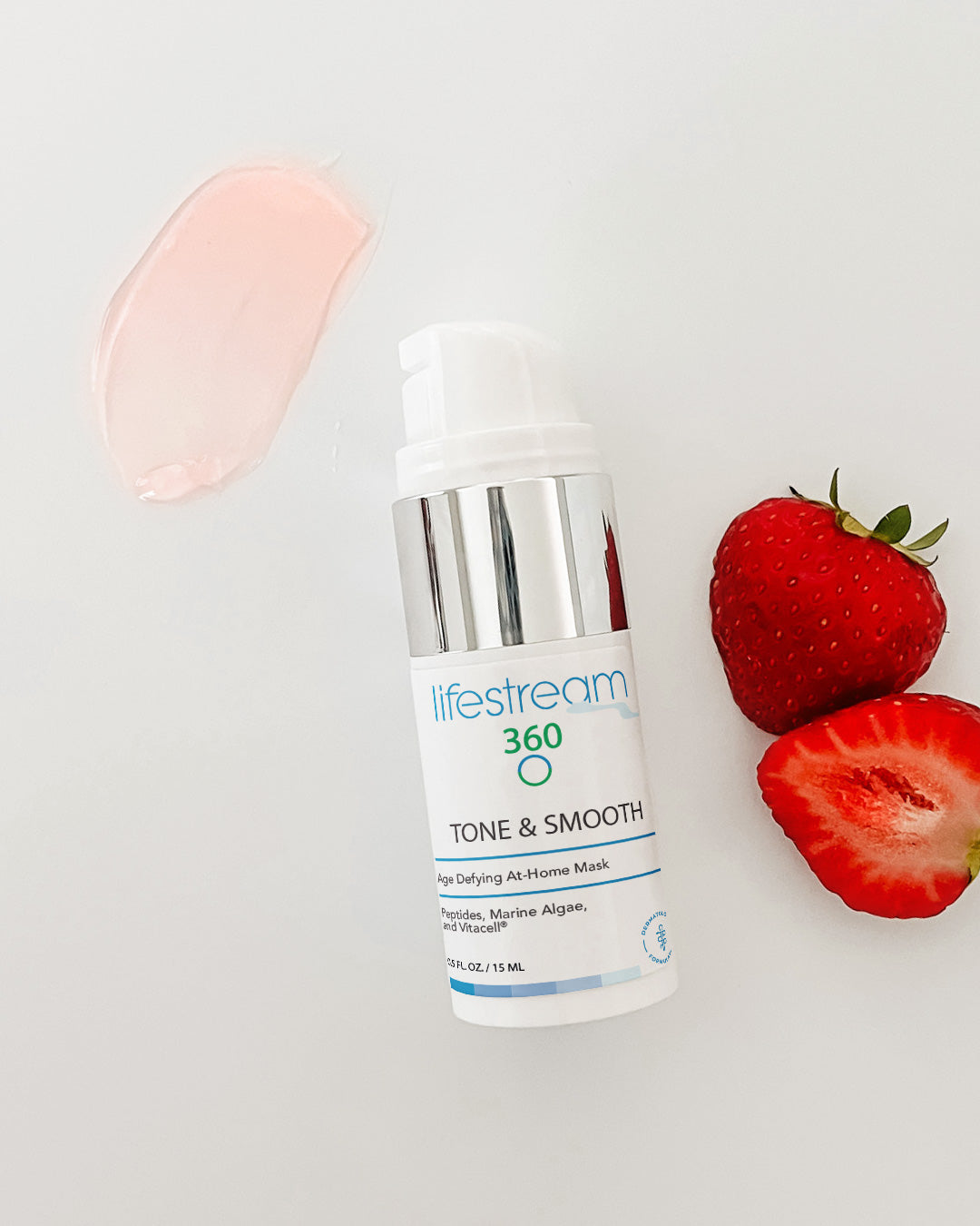 Lifestream 360 anti aging gel mask bottle with strawberries on a light gray background