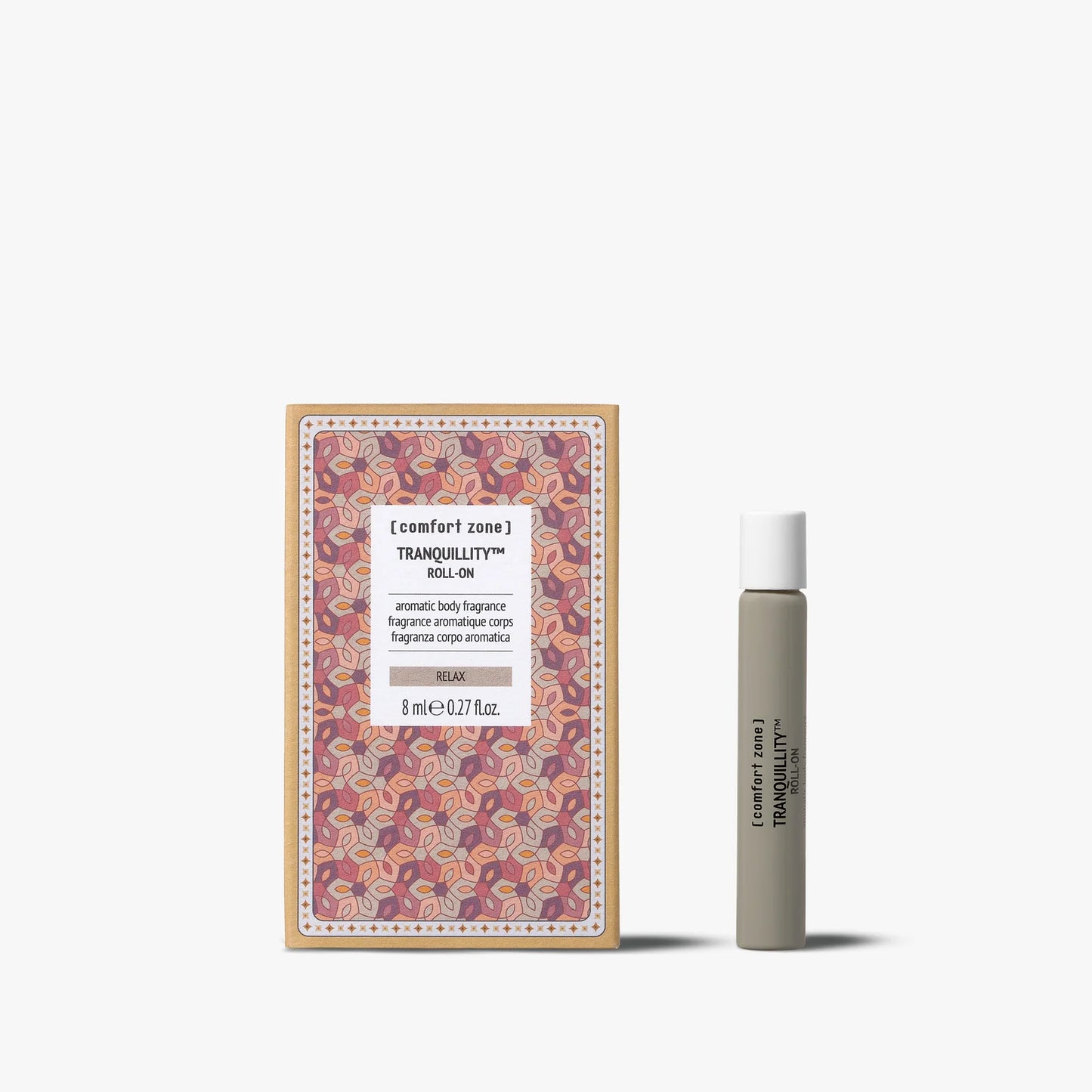 Tranquillity roll-on oil decorative box next to tube of product with a white background